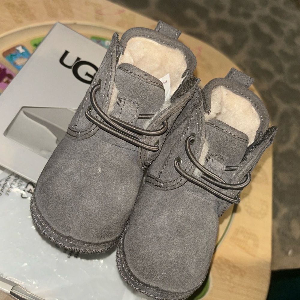 Grey Neumel Ugg Boot Size 6-12 month size. Worn only once.